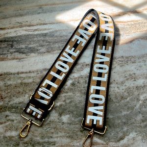 Ah*dorned brand crossbody strap. “LOVE”